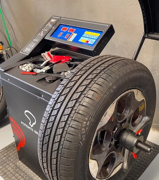 Equipamento de balanceamento e roda na CARTOP